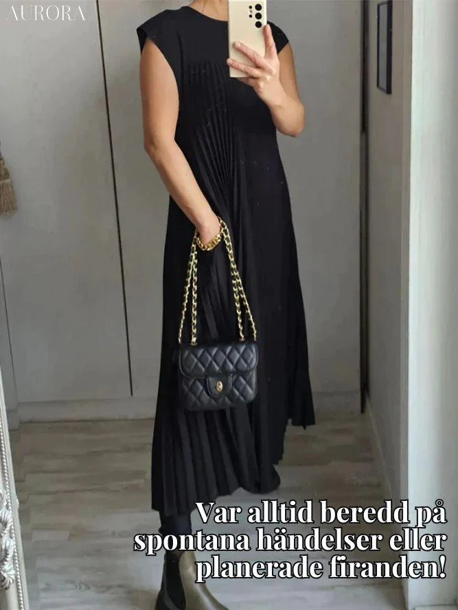 TILLFÄLLIGT 50% RABATT | Carmela™ | Ärmlös, plisserad, enfärgad klänning - Image 5